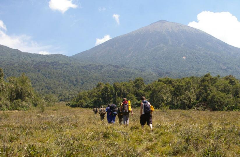 Tourists climb Karisimbi mountain which hosts Karisimbi mast. The EUu00e2u20acu2122s financial support is intended for projects that promote regional integration. (File)rn