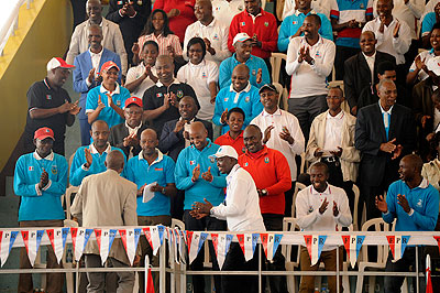 RPF members singing during the meeting at petite stade on Sunday. (T. Kisambira)