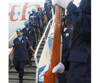 A Rwanda National Police contigent, that included women officers, arrive at Kigali International Airport from a tour of duty in Haiti last year. (File)