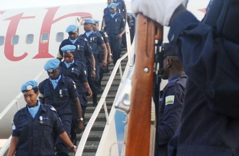 A Rwanda National Police contigent, that included women officers, arrive at Kigali International Airport from a tour of duty in Haiti last year. (File)