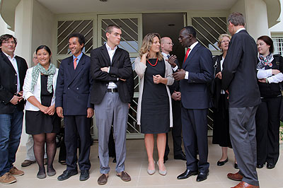 Chief Justice Prof. Sam Rugege (R) chats with Anna Von Harmer as the other members of the delegation look on after the meeting yesterday. (John Mbanda)