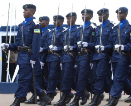 Police officers march during a past parade. Rationalising the law and order sector through a merger of the different organs was more viable for it allowed for common training, unified command and control; and the consolidation of resources and equipment.File.