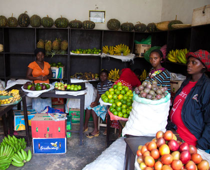 Above; Access to finance for entreprenuership has been a major milestone towards gender equality and below, to economically empower themselves, Rwandan women have taken to establishing their own small businesses. File photos