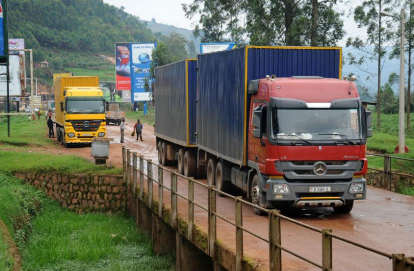 East African cross-border trade is still lagging. Trucks crossing into Rwanda from Uganda at the Gatuna border. (John Mbanda)