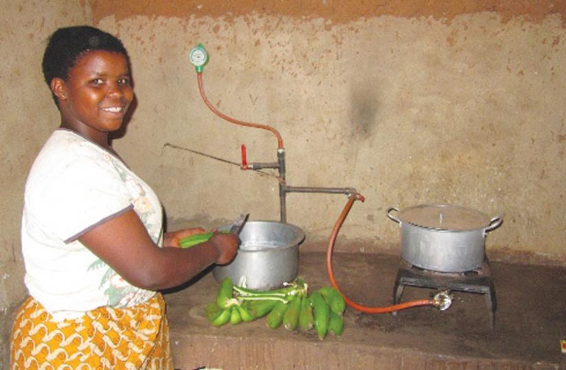 A woman prepares food using bio-gas. The RSB is drafting new guidelines to regulate the bio-energy sector.  (Net photo)