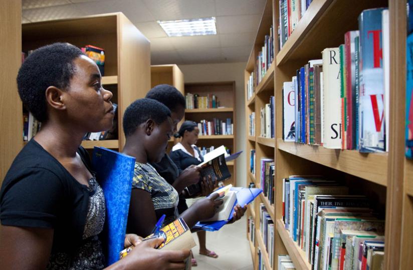 Readers search for books at Kigali Library Services in Kacyiru. (File)