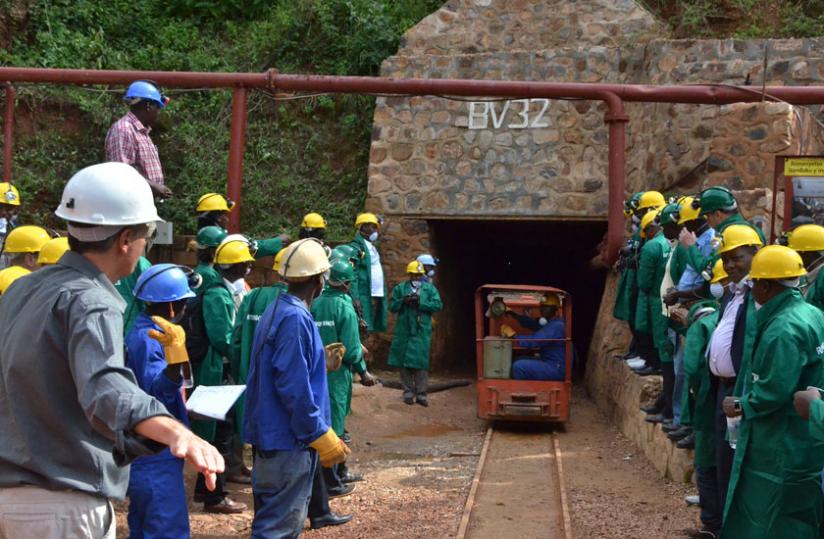Visitors prepare to enter a tunnel at Rutongo Mines in Rulindo District last year. (File)
