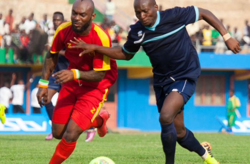 Cassa Mbungo will rely on the goals of striker Jimmy Mbaraga, right, seen here action against Pascal Wawa of El Merreikh, as he bid lead to Police FC to their first league title next season. (Timothy Kisambira)