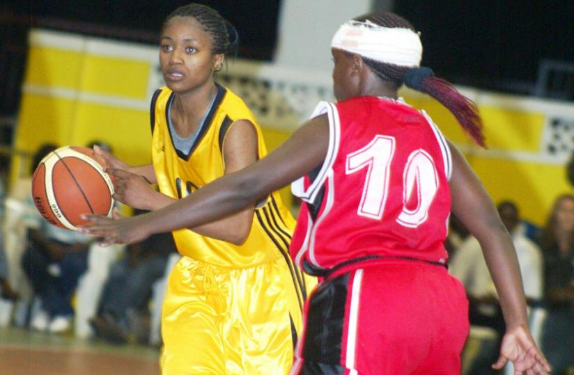 The women's team captain Honore Ayebare, left, seen here playing against Uganda during the 2011 Zove V tourney in Kigali. (File photo)