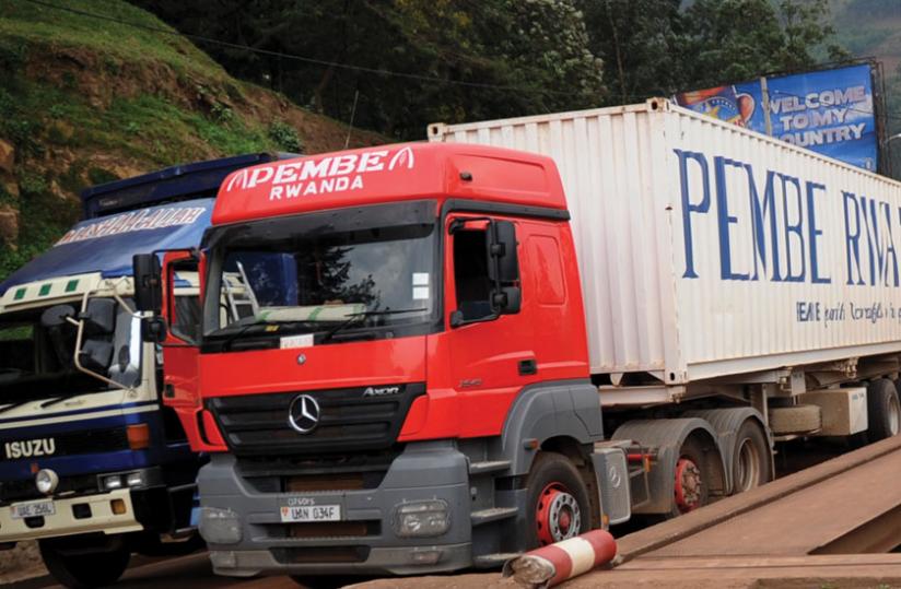 Cargo trucks await clearance at Gatuna border. The government will soon allow importation of right hand drive cargo trucks of 30 tonnes and above to support local logistics firms. (File)