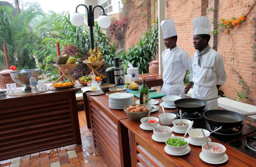Chefs at Hotel Mille Collines wait to take orders from clients in the recent past.   (John Mbanda)