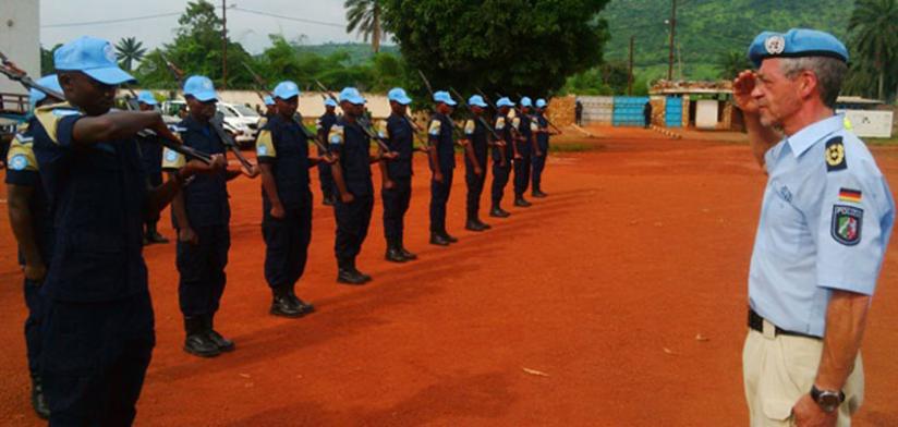 Members of the Rwanda Formed Police Unit in CAR welcome Feller to their camp in Bangui yesterday. (Courtesy)