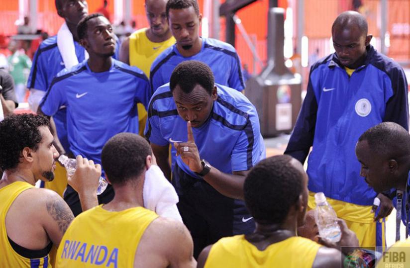 Head coach Moise Mutokambali gives tips to his players in a past continental tournament. (Courtesy)