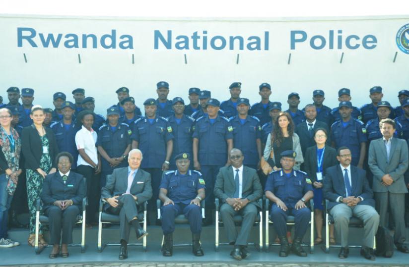 IGP Gasana with Saber Azam and other participants at the just concluded international protection of refugees workshop. (Robert Kagabo) 