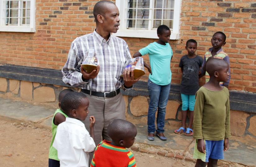 Damas Gisimba with some of the children at his orphanage. (File)