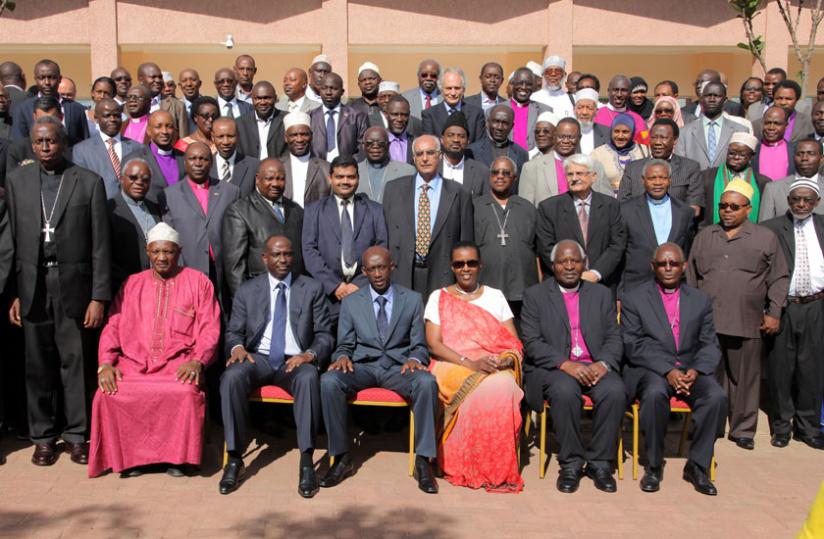 EAC Secretary General Richard Sezibera (2nd left seated), Local Government minister Francis Kaboneka, and EAC Minister Valentine Rugwabiza with religious leaders at the conference in Kigali yesterday. (John Mbanda)
