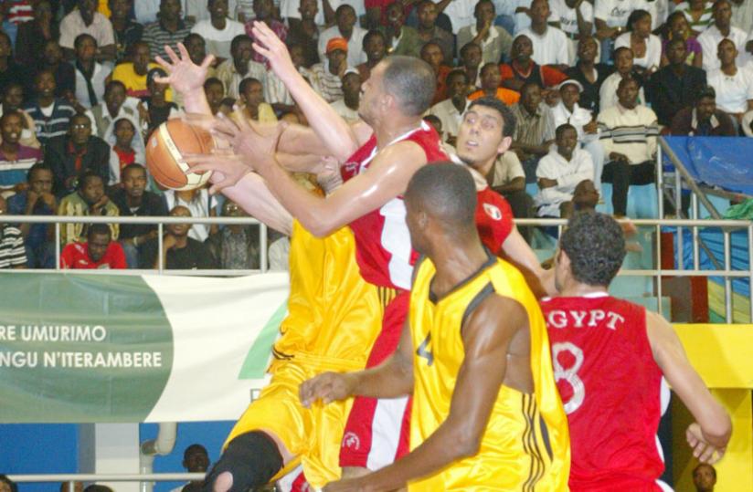 Rwanda basketball national team take on Egypt in a past zonal edition held in Kigali. Rwanda lost the opening game against the Egyptians yesterday in Kampala, Uganda. (Courtesy photo)
