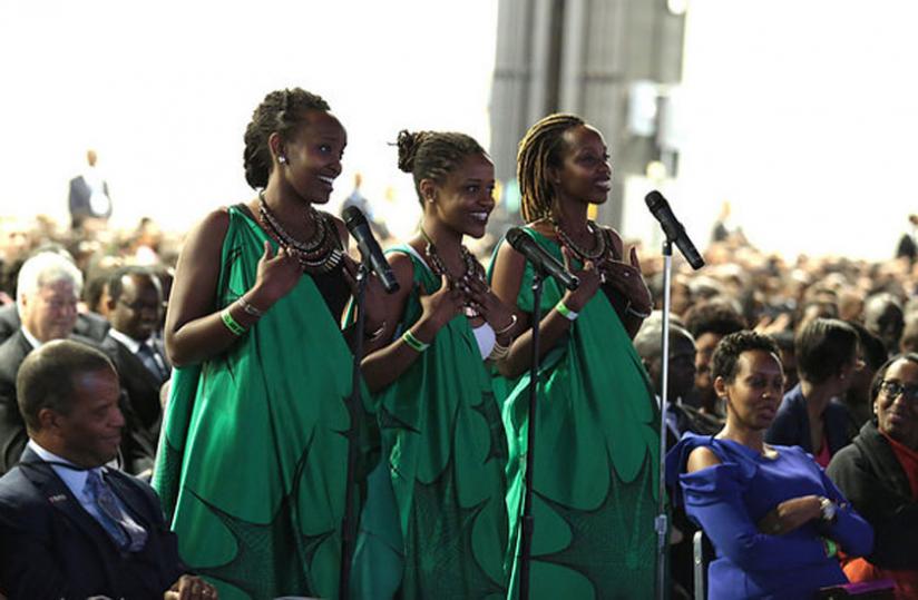 Angel Uwamahoro (middle) leads the poets