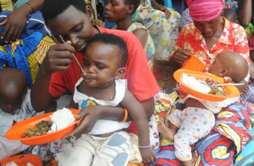 Women feed children at a past Nutrition campaign in Butamwa, Nyarugenge District. (File)