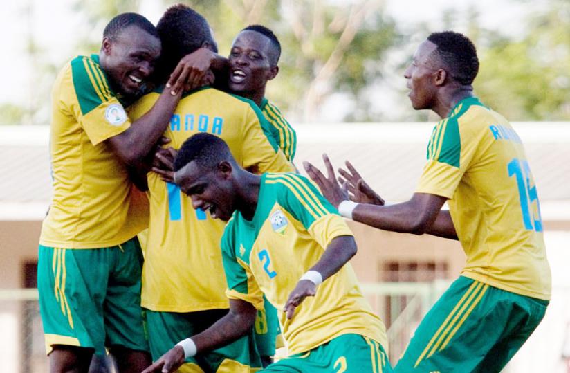 Amavubi players celebrate a goal against Congo Brazzaville at Kigali Regional Stadium on May 31. (Timothy Kisambira)