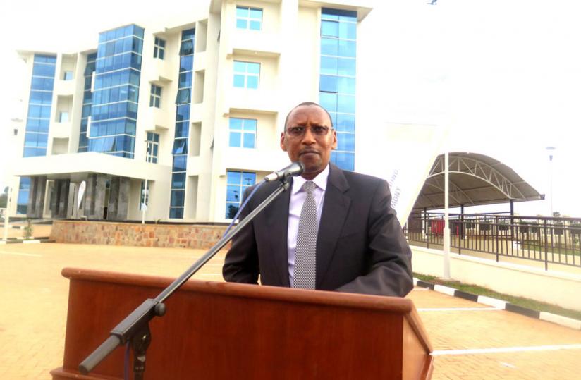 Rwangombwa speaks at the launch of the Rwamagana BNR branch at the background. (S. Rwembeho)