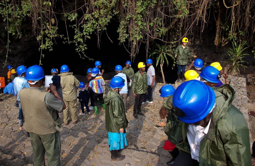 Tourists being briefed before beginning a tour of Musanze Caves. Tourism is a major foreign exchange earner (T. Kisambira)