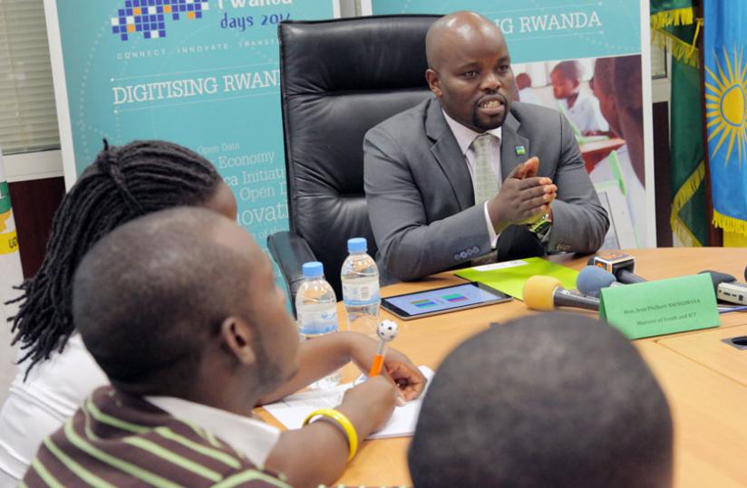 Nsengimana addresses journalists at his office in Kigali yesterday. (John Mbanda)