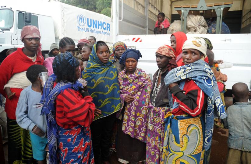Returnees from Uganda at Gatuna border post in 2012. Some countries are yet to invoke the UNHCR Cessation Clause. (File)