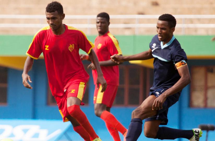 Police FC skipper Moussa Mutuyimana, right, seen here playing against El Merreikh during the Cecafa Kagame Cup 2014, says Rayon must meet his demands first. (File)