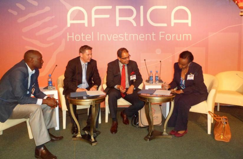L-R, Benjamin Manzi, director of investment at Rwanda Development Board, Stuart Cook, the MD of Protea Hotels East Africa, Igor Cesar, project manager of Kivu Marina Bay Project, and Amb. Yamina Karitanyi, head of tourism and conservation at RDB, during the signing ceremony in Ethiopia. (Courtesy) 