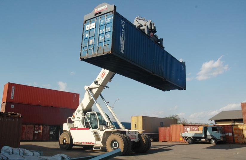 A crane unloads a container of imported goods at Magerwa in Gikondo. (File)