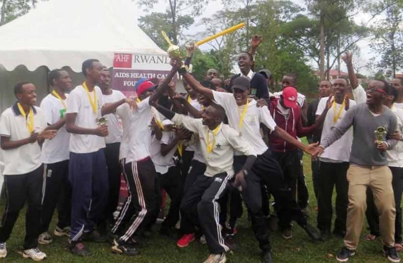 Lycu00c3u00a9e de Kigali players celebrate after winning this yearu00e2u20acu2122s inter-schools boys cricket tournament on Saturday.