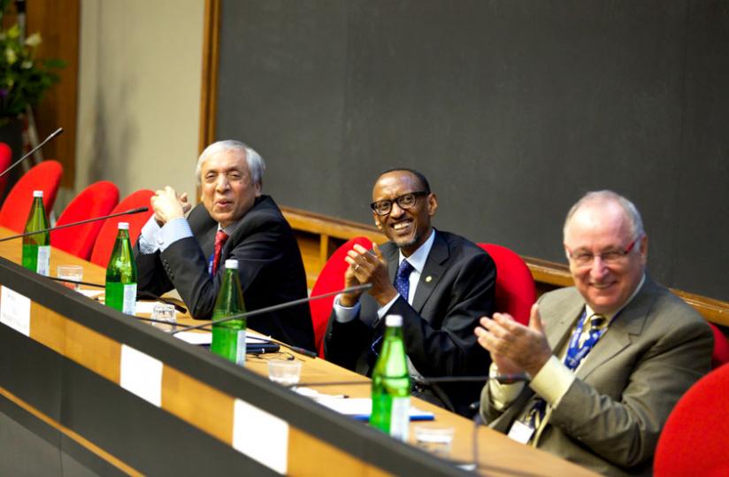 President Kagame, Ansar Parvez, the chairperson of Pakistan Atomic Energy Commission (L), and Luciano Maiani, chairperson of ICTP Scientific Council,  follows proceedings at ICTP in Trieste, Italy, yesterday. (Village Urugwiro)