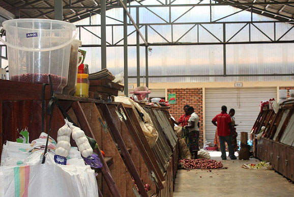 Traders at the Kabeza market in Kigali. RRA accuses the market owner, Louis Aboyezuyantije, of failure to honour his tax obligations. (Internet photo)