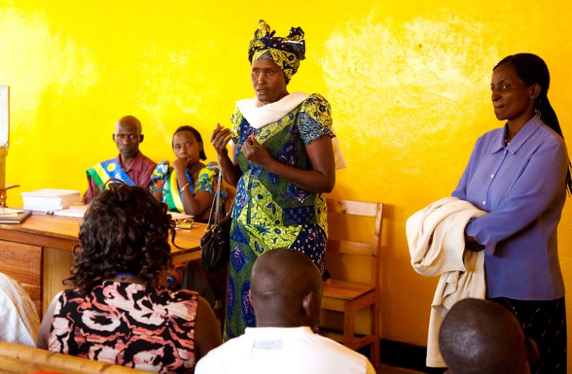 A woman in Karongi District (C) during an Abunzi court session. (Timothy Kisambira)