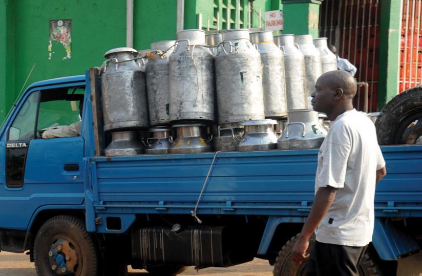A dealer prepares to transport milk. Standards body encourages small businesses to ensure quality. 