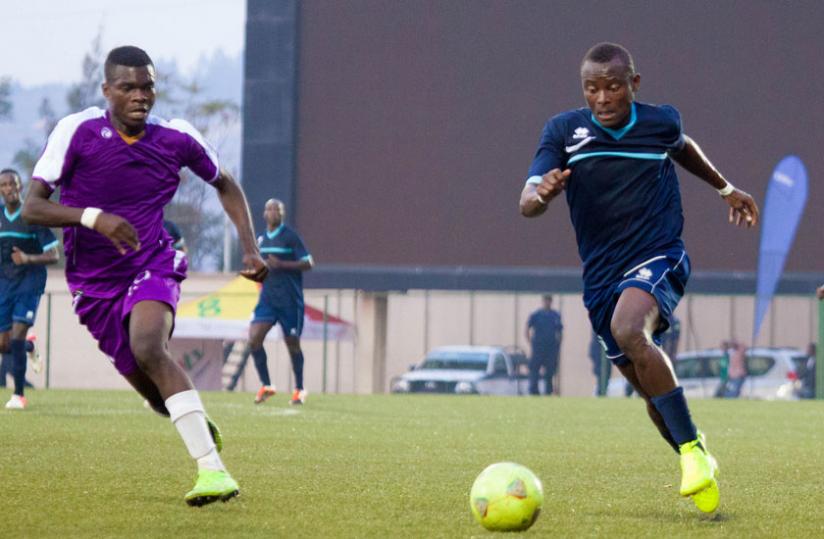 Striker Sina Jerome gets past a Vitalu00e2u20acu2122O player in the Cecafa Cup in August. He is embroiled in a controversy over his move to Rayon Sport. (File)