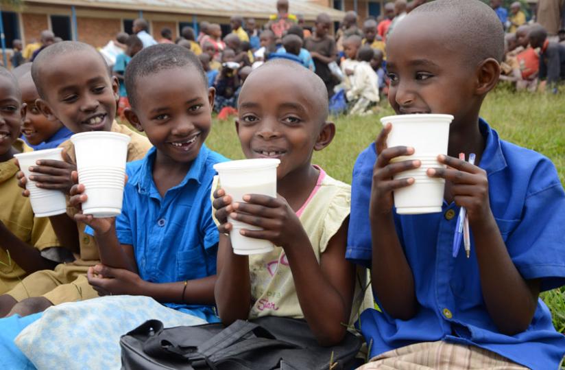 Children enjoy milk at school. (File)