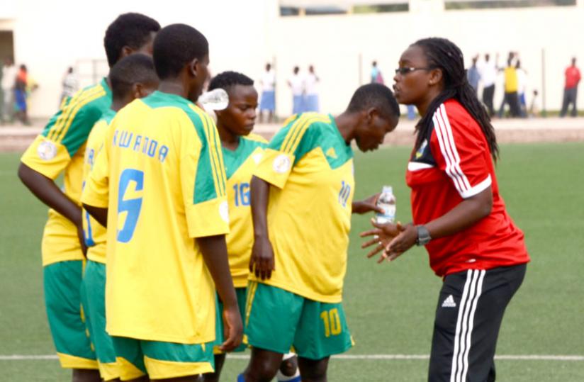Nyinawumuntu giving instructions to her players during the 2014 Africa Women Championships qualifier against Nigeria in Rubavu. (S. Ngendahimana)
