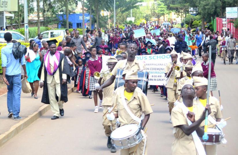 Hundreds joined in a procession to mark the launch of a school. (Stephen Rwembeho)