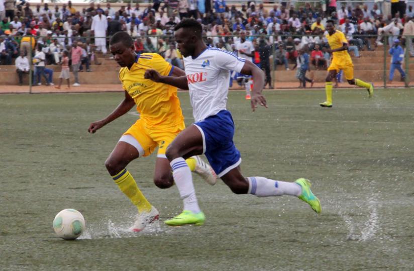 Rayon Sport Striker Peter Otema (blue and White) wants to help the blues reclaim the National Football league. (John Mbanda)