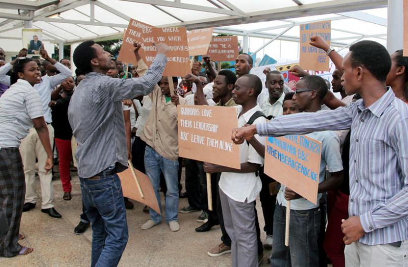 Demonstrators chant anti-BBC slogans in Kigali yesterday. (John Mbanda)