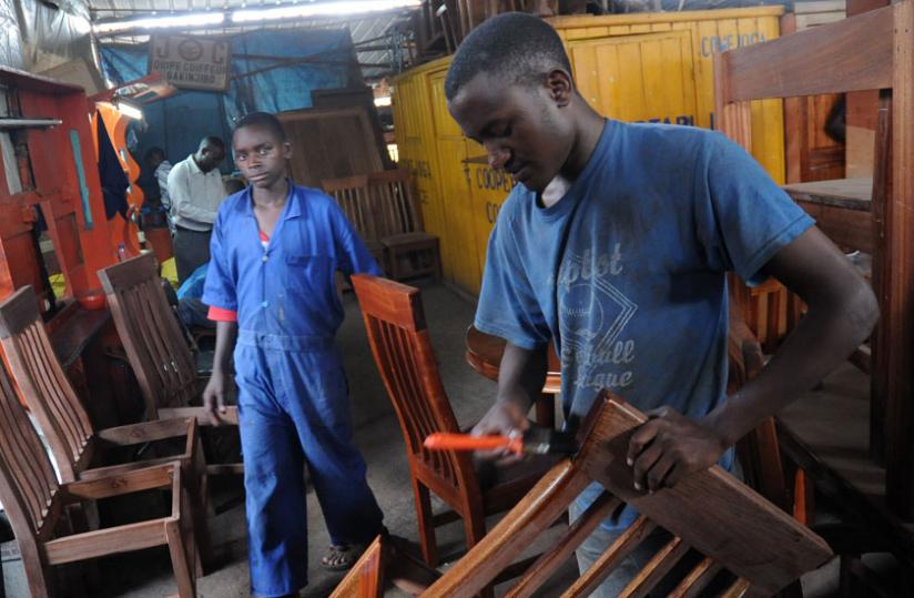 Youth engaged in wood work in Gakiriro workshop in Kigali last year.  (John Mbanda)