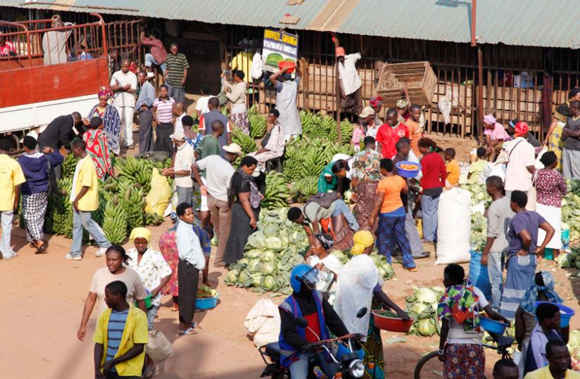 A busy fresh foods area of Kimironko Market in Gasabo District, Kigali. (Timothy  Kisambira)