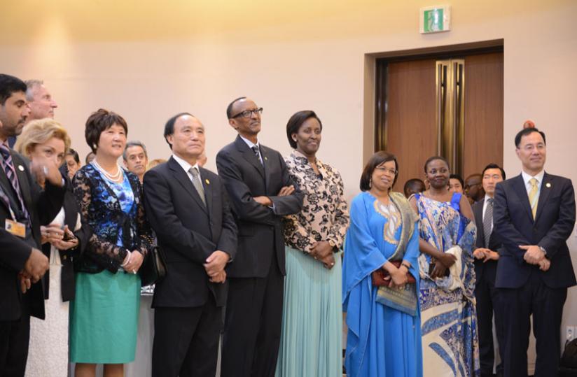 President Kagame and First Lady Jeannette Kagame with ITU Secretary General Elect Houlin Zhao, Mrs Zhao and Mrs. Toure during Dr. Toure's speech at the Gem-Tech Award ceremony at the ITU Plenipotentiary meeting in Busan, South Korea.rn(Village Urugwiro)rn