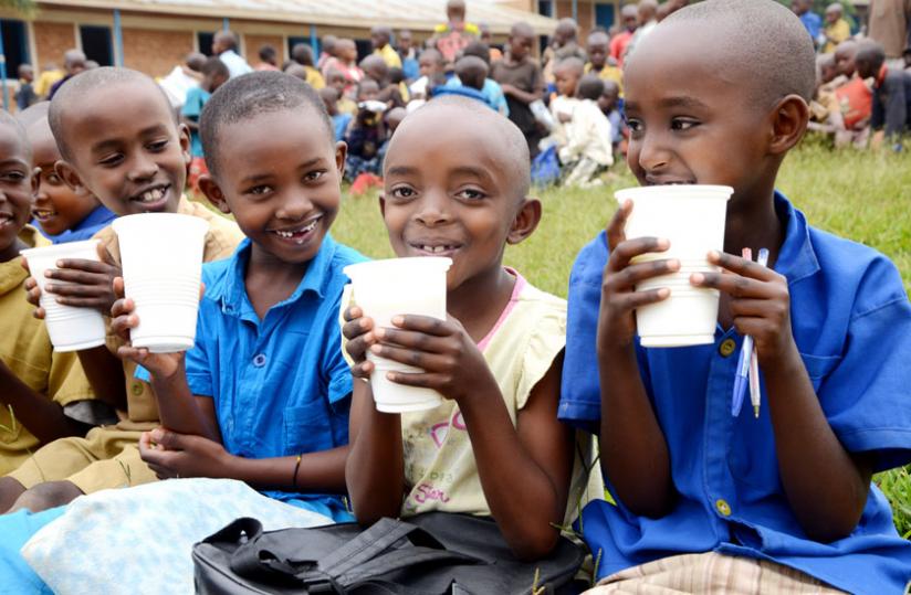 Children enjoy milk at school. The government has in place several campaigns and initiatives such as One Cup of Milk per Child, 1000 Days and promotion of mineral-rich beans, among others, to fight malnutrition in the country. (File)