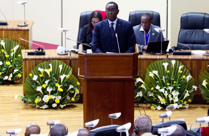 Makuza addresses the conference at Parliament yesterday. (Timothy Kisambira)