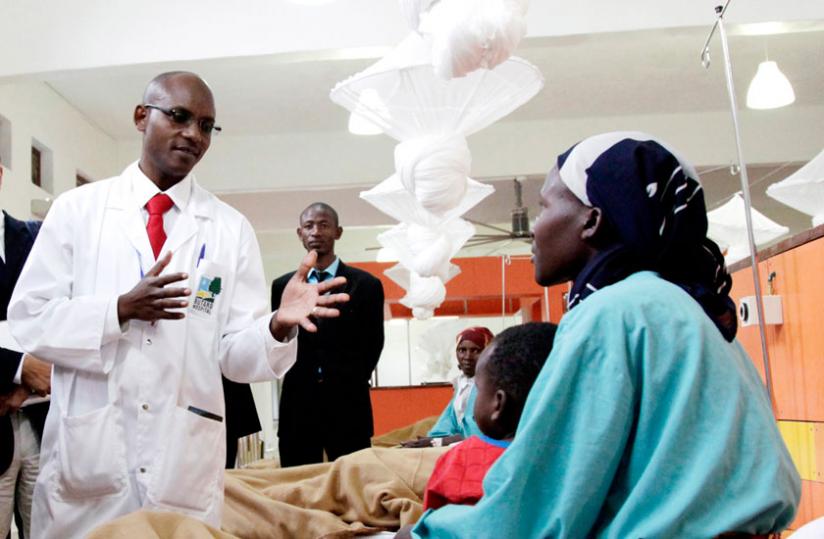 A doctor talks to a patient at Butaro Hospital in 2012. (File)