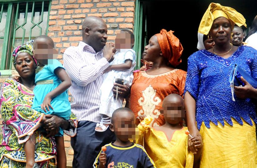 Foster families pick children from Mpore Pefa Orphanage in Gikondo before its closure in 2012. (File)