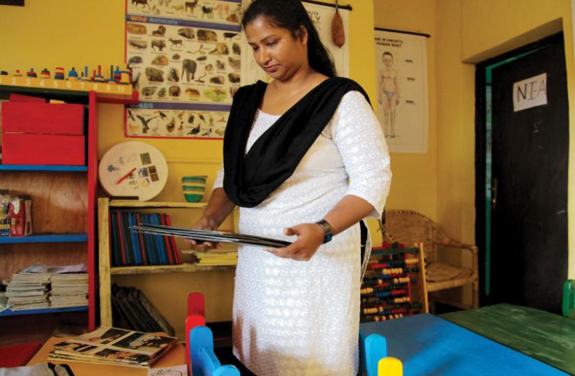 Little Flowers School founder, Milcah Grace Aziz, in one of the classrooms.